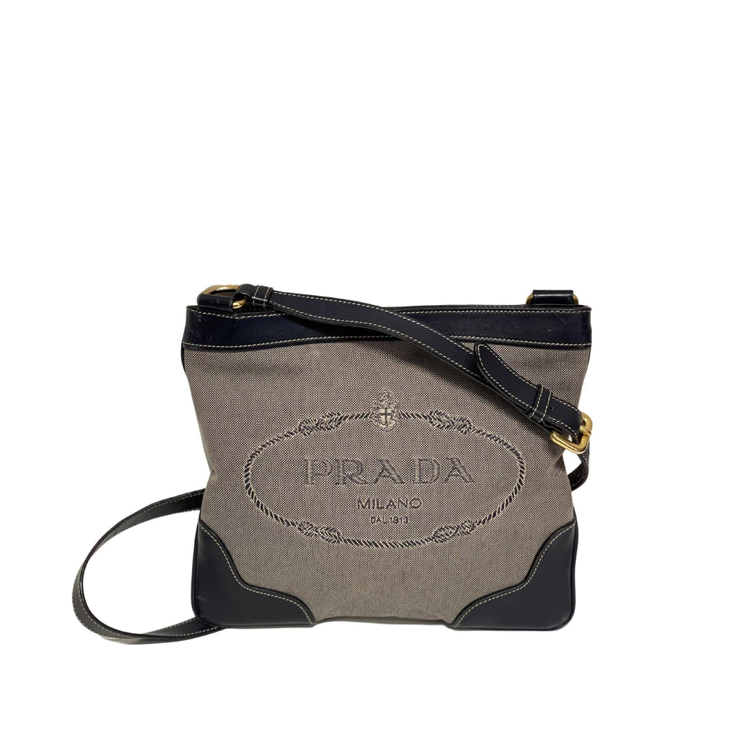 Borsa a tracolla blu in tessuto e pelle
